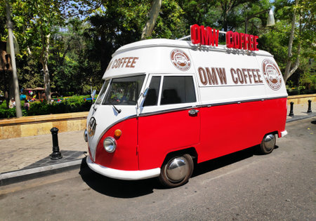 BAKU, AZERBAIJAN - JULY 11, 2023 : Street coffee shop of old retro minibus. car is equipped for sale of coffee and drinksのeditorial素材