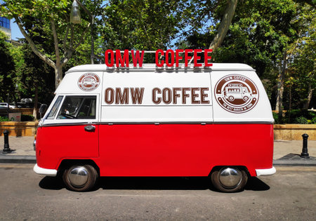 BAKU, AZERBAIJAN - JULY 11, 2023 : Street coffee shop of old retro minibus. car is equipped for sale of coffee and drinksのeditorial素材