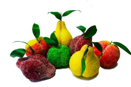 Sweets made of dough in the form of fruit, apple, pear, plum and alchi on a white backgroundの写真素材