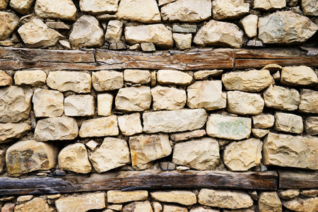 pattern gray color of modern style design decorative uneven cracked real stone wall surface with cementの写真素材