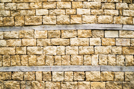 pattern gray color of modern style design decorative uneven cracked real stone wall surface with cementの写真素材