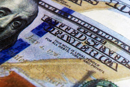 Benjamin Franklin's face on the US 100 dollar bill. Closeup of Ben Franklin on a one hundred dollar...