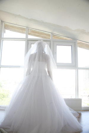 the bride and groom close up the house, walking in the city hdの写真素材