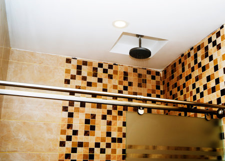 Detail of modern ceiling shower in the bathroomの写真素材