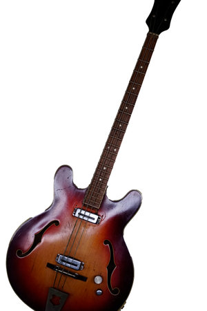 red six-stringed electric guitar isolated on white backgroundの写真素材