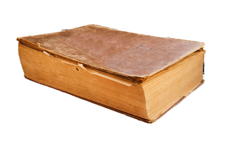 a very old book on a white backgroundの写真素材