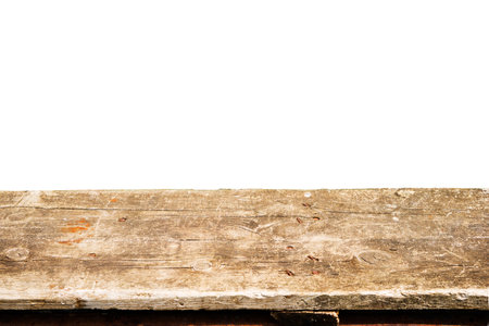 Wooden tabletop on white background. Empty rustic wood tableの写真素材