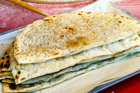 Traditional azerbaijani cuisine flat bread with herbs and meat. Azerbaijan national cuisine kutab or qutabの写真素材