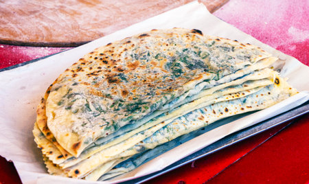 Traditional azerbaijani cuisine flat bread with herbs and meat. Azerbaijan national cuisine kutab or qutabの写真素材