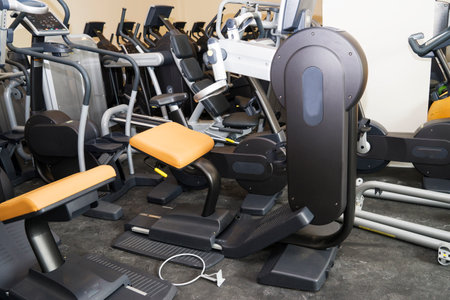 Gym room for residents in apartment building. Different exercise equipments and weights.の写真素材