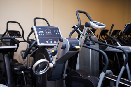 Gym room for residents in apartment building. Different exercise equipments and weights.の写真素材