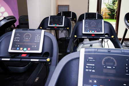 Gym room for residents in apartment building. Different exercise equipments and weights.の写真素材