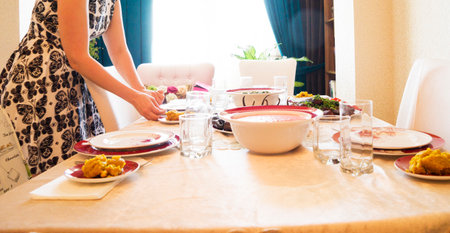 Woman Preparing Table Dinner Concept,tonedの写真素材