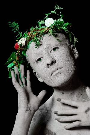Mother Earth portrait. Black background. Studio shot.の写真素材