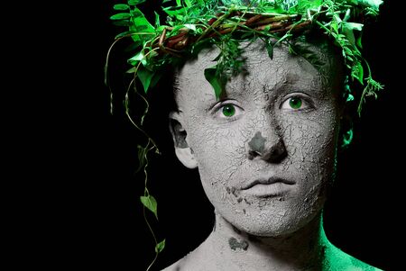 Mother Earth portrait. Black background. Studio shot.の写真素材