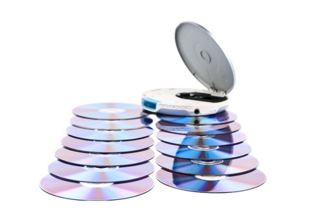 CD-Player with comcact disks. White background. Studio shot.