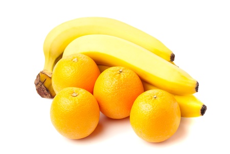 group of oranges and bananas shoted on white background. studio shotの写真素材