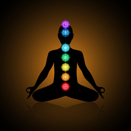 Black silhouette of a human in lotus position with colrful chakrasのイラスト素材