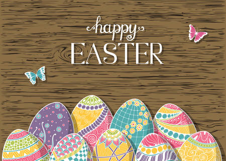 Hand drawn easter eggs composition on wooden background for greeting card design, Happy Ester lettering.のイラスト素材