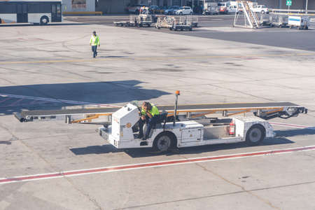 Abu Dhabi; UAE - March 2020: Abu Dhabi International airport; Ground staff at workのeditorial素材