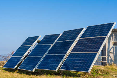 Solar panels in the mountain region. Green and environmentally friendly sources of energy. Stock photoのeditorial素材