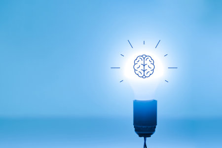 Burning lightbulb with brain icon on it