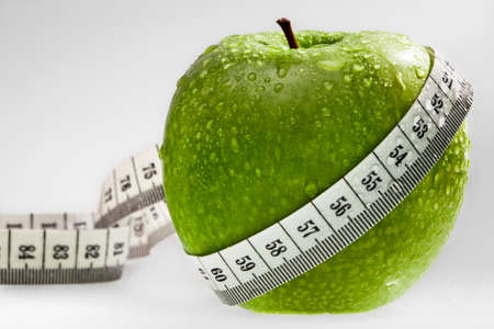 Green apple as concept of healthy dietの写真素材