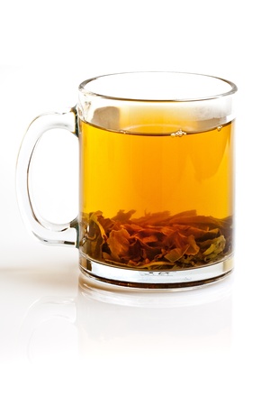 Leafy tea green in mugの写真素材