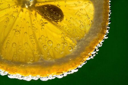 Lemon fruit in sparkling waterの写真素材