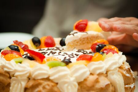 Delicious birthday cake with fruits