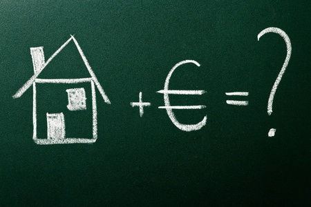 Concept of home buying on green blackboardの写真素材