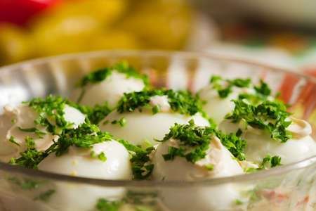 Homemade salad with eggs and parslay