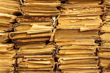 Pile of old books in the libraryの写真素材