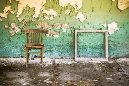 Abandoned building with peeling wallの写真素材
