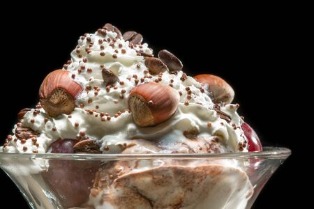 Closeup hazelnut ice cream in glass bowl