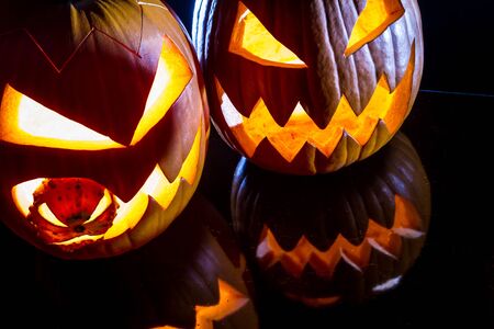 Close-up of two pumpkins for Halloweenの写真素材