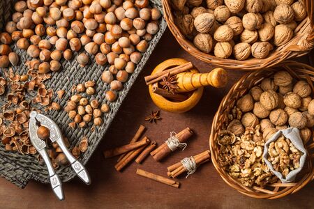 Nuts and cinnamon as the various ingredientsの写真素材