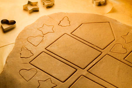 Prepare baking Christmas cookies made from gingerbread