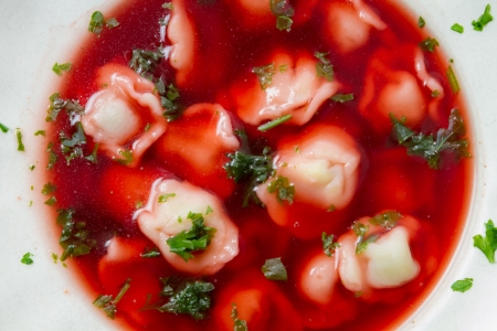 Close-up of a plate of borscht with dumplings