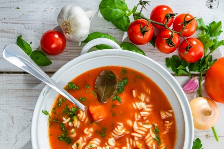 Close-up on the vase with tomato soup
