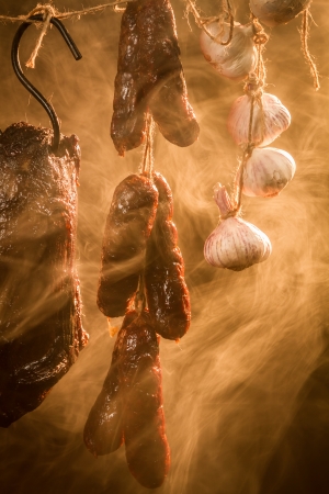 Smoked homemade meat in a natural wayの写真素材