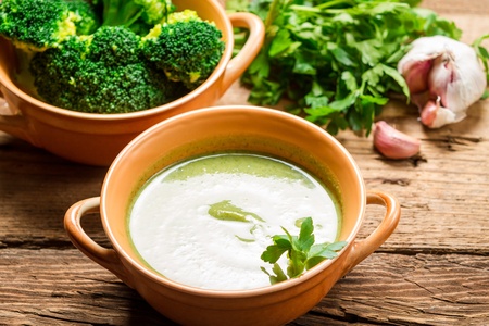 Closeup of broccoli soup made of fresh vegetables, garlic and parsleyの写真素材