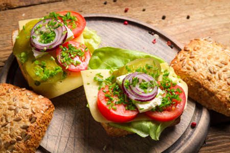 Sandwich with tomato, onion and lettuceの写真素材