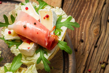 Fresh sandwiches with parma ham and camembert cheeseの写真素材