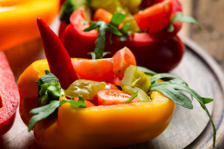 Closeup of vegetables salad served in peppersの写真素材
