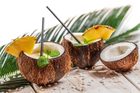 Fresh pinacolada drink served in a coconutの写真素材