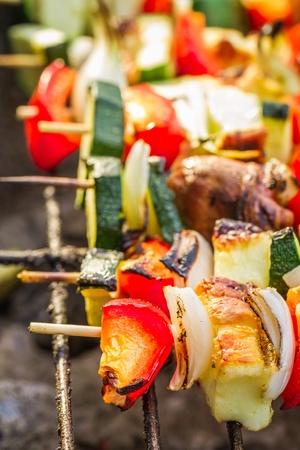 Closeup of hot skewers on the grateの写真素材