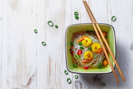 Chinese soup with shrimp and rice noodlesの写真素材
