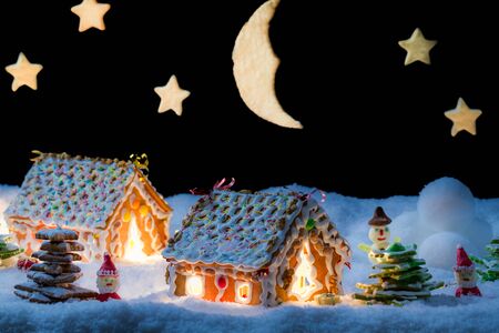 Gingerbread home with snowman and santa