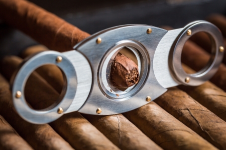 Guillotine cutting off cigar tipの写真素材
